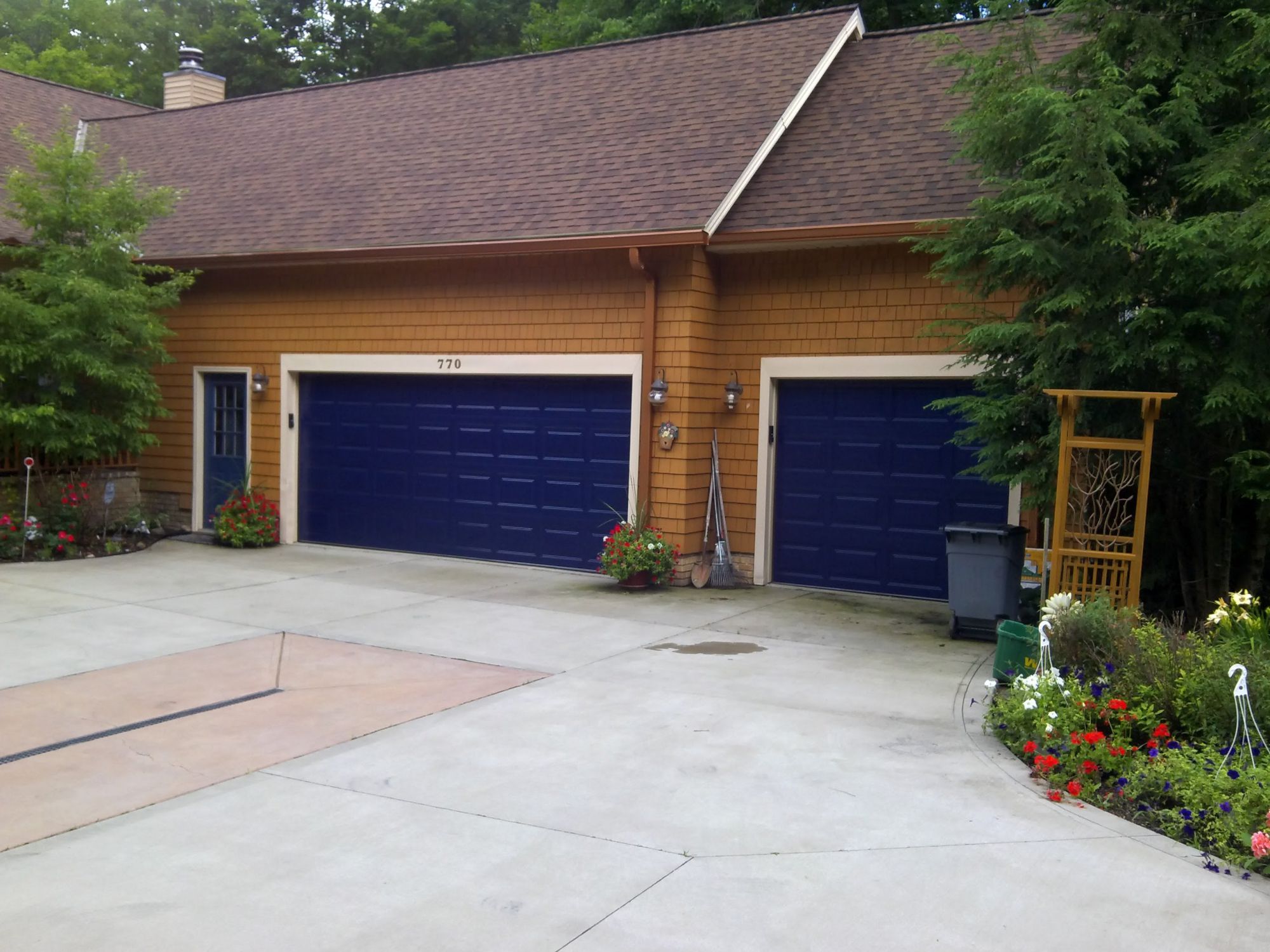Blue garage door after J&M Doors